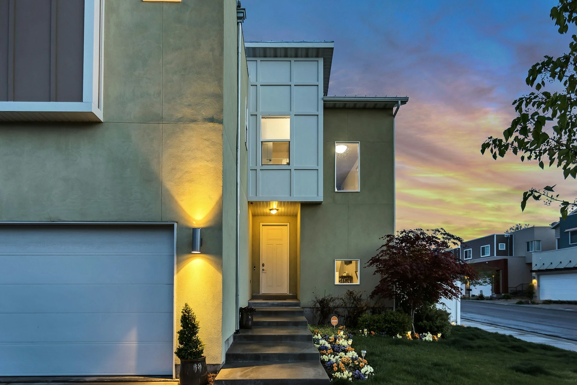 Contemporary home at dusk — original Vision Vista Realty website photography
